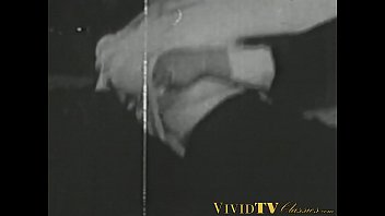 Black and white vintage video of lady sucking her lover